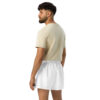 A man with short dark hair and a beard stands facing away, looking left. He sports a light beige t-shirt with BAAS Athletic Shorts in crisp white, capturing a casual sportswear vibe against the plain white background. A man with short dark hair and a beard stands facing away, looking left. He sports a light beige t-shirt with BAAS Athletic Shorts in crisp white, capturing a casual sportswear vibe against the plain white background.